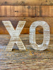 Distressed wooden X and O . The XO Cut Out Letters Set.