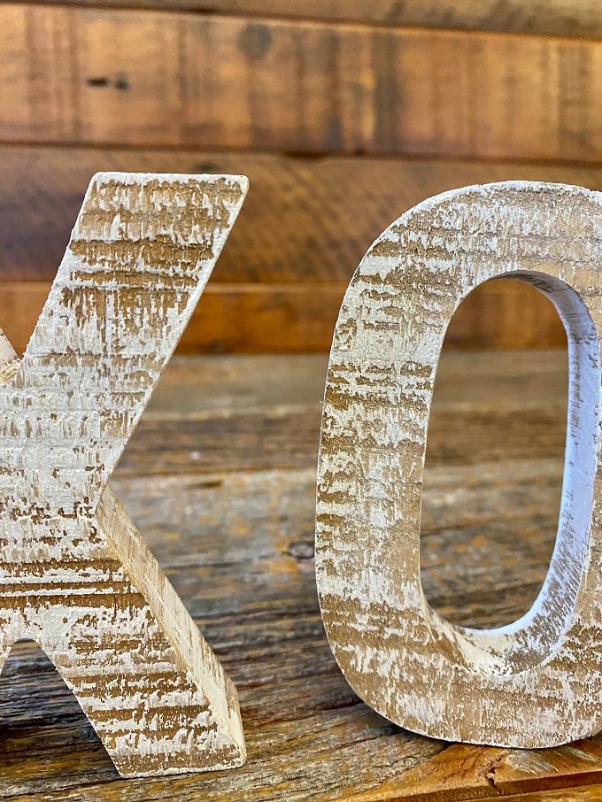 Close up of distressed wooden X and O, the XO Cut OUT Letters Set..