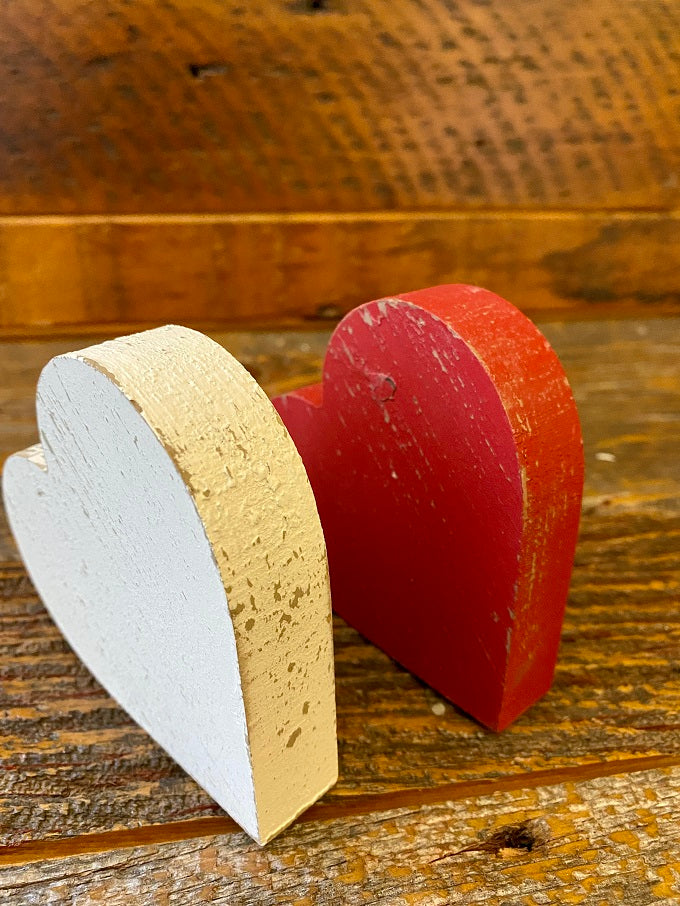 Side profile of the Distressed Hearts - Two Colours. One is white and one is red.