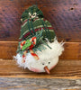 This little plush snowman has a green toque tied at the top. He has a round face, tiny carrot nose and painted face. 