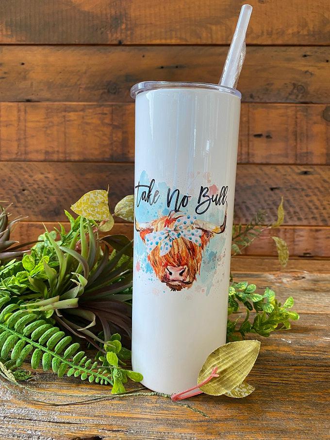  This is a white enamel coated stainless steel water, so it looks shiney! The water bottle comes with a reusable straw and is imprinted on both sides with a picture of a water-colour painted highland cow with a kerchief in its hair. Printed above the picture are the words Take no bull. The words are printed in black.