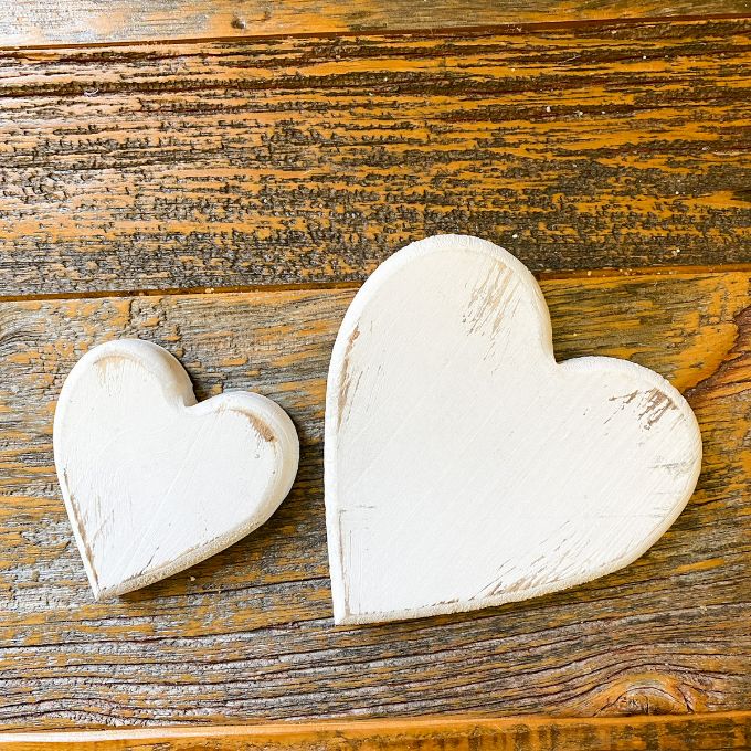 White Wooden Distressed Hearts - Set of Two available at Quilted Cabin Home Decor.