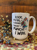 A white ceramic coffee mug that it is imprinted on both sides with a dancing unicorn with rainbow colour hair and a blue dress. The saying is printed in black and says Rock, Paper Scissors, Throat Punch I win.