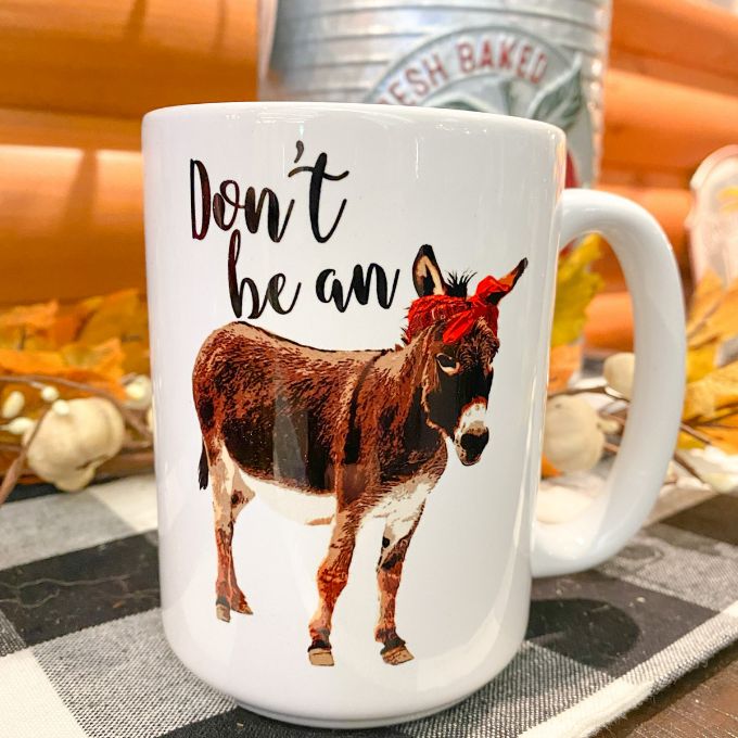 Don't Be an Ass Mug available at Quilted Cabin Home Decor.
