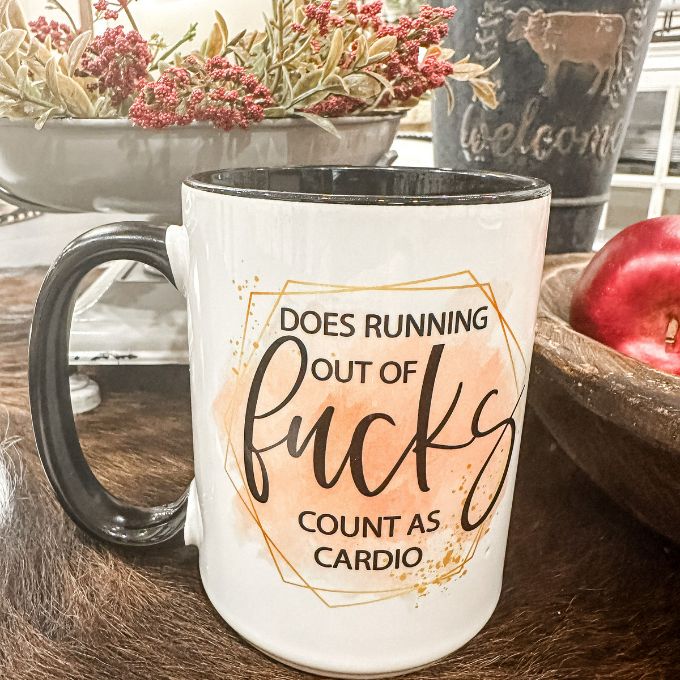 Does Running out of F's Count as Cardio Mug available at Quilted Cabin Home Decor.