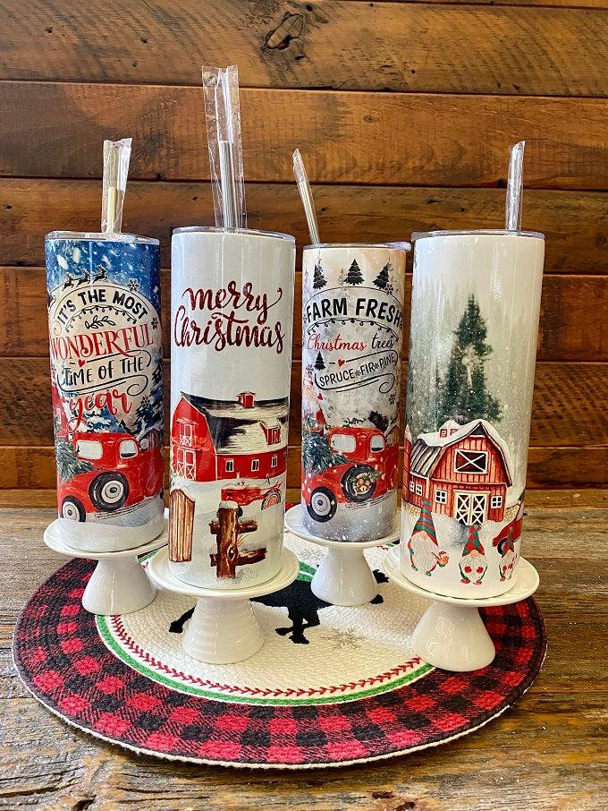 A photo of the four different Christmas hot/cold tumbler bottles.